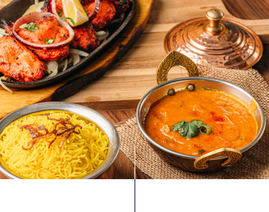 Indian chicken tikka masala in copper bowl